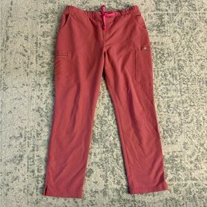 FIGS Women's Yola Skinny Scrub Pants in the color Terracotta size large